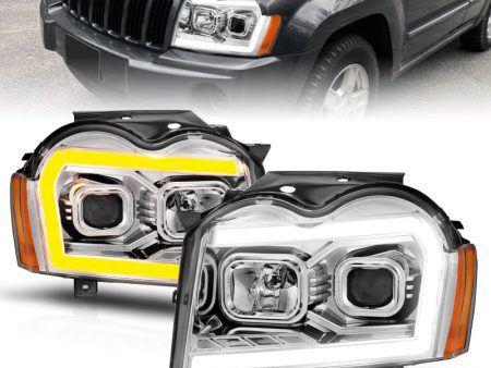 ANZO 05-07 Jeep Grand Cherokee Projector Headlights - w  Light Bar Switchback Chrome Housing Online Sale